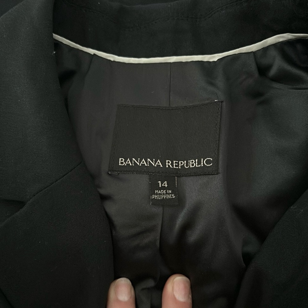 Banana Republic black vest (purchased in Canada) size 14, with black fringe.